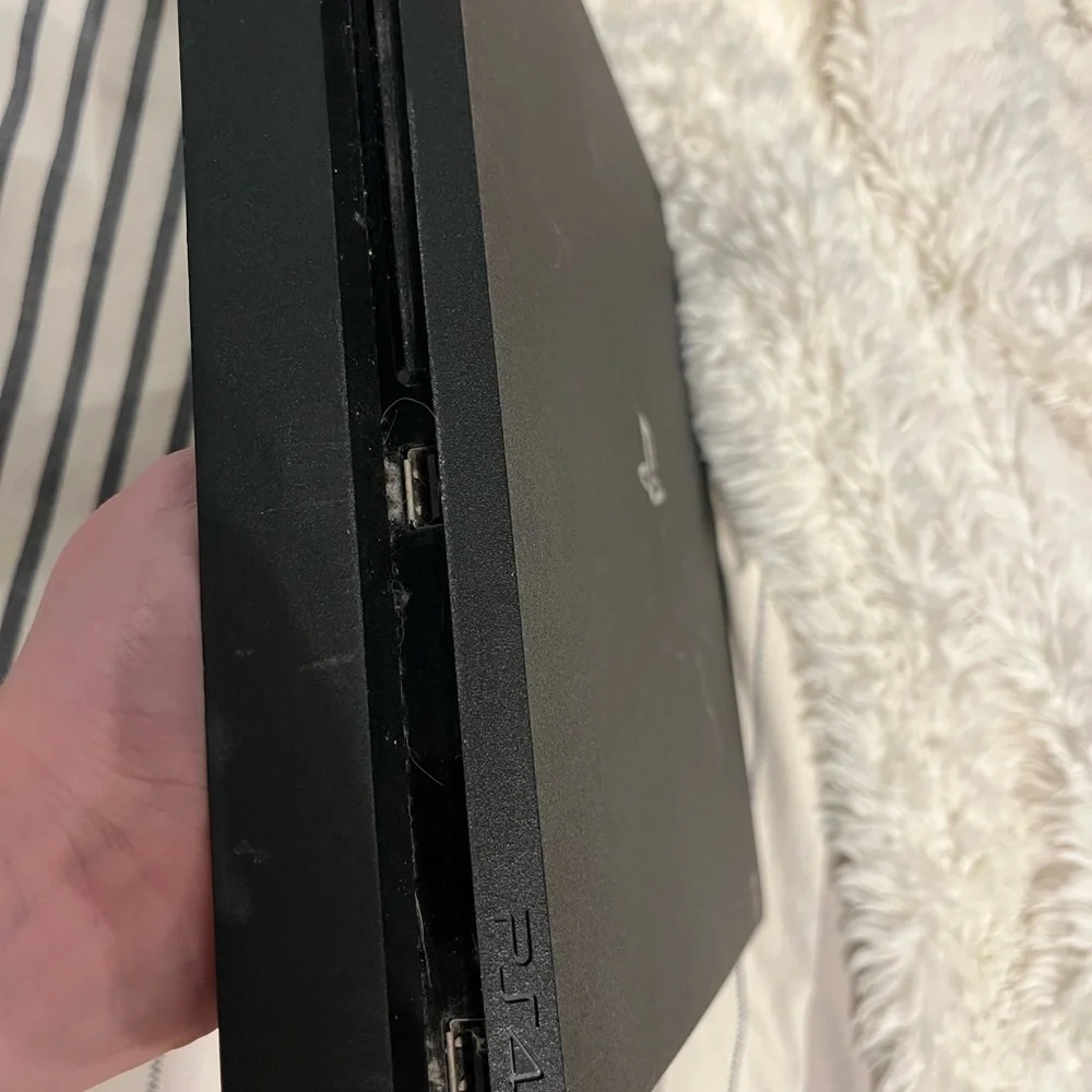 Sony Console with Black Controller